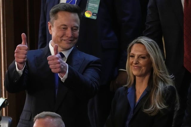 Elon Musk and Heather Valentino, before President Donald Trump addresses a joint session of Congress in the House chamber at the U.S. Capitol in Washington, Tuesday, March 4, 2025.