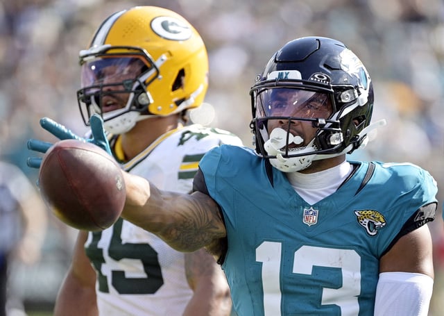 Oct 27, 2024; Jacksonville, Florida, USA; Jacksonville Jaguars wide receiver Christian Kirk (13) signals a first down during the second half against the Green Bay Packers at EverBank Stadium. Mandatory Credit: Melina Myers-Imagn Images/File Photo