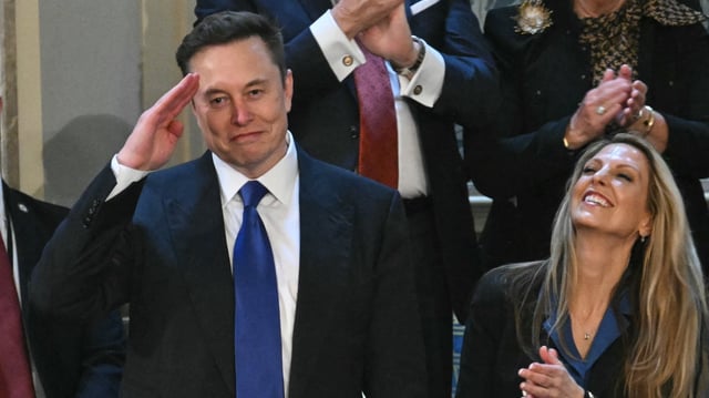 The mystery woman next to Elon Musk has been identified.