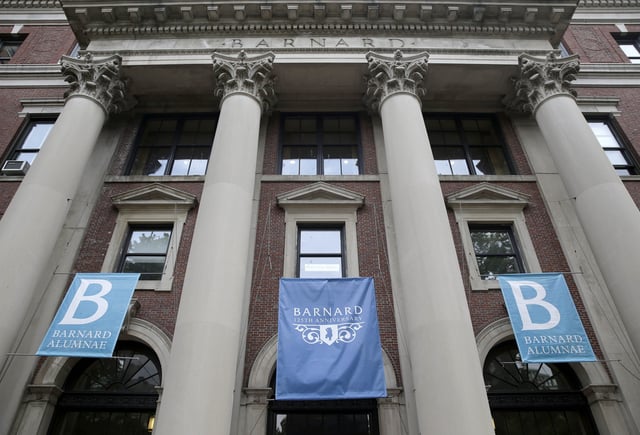 FILE - Banners hang from a building at Barnard College, May 28, 2015, in New York. (AP Photo/Seth Wenig, File)