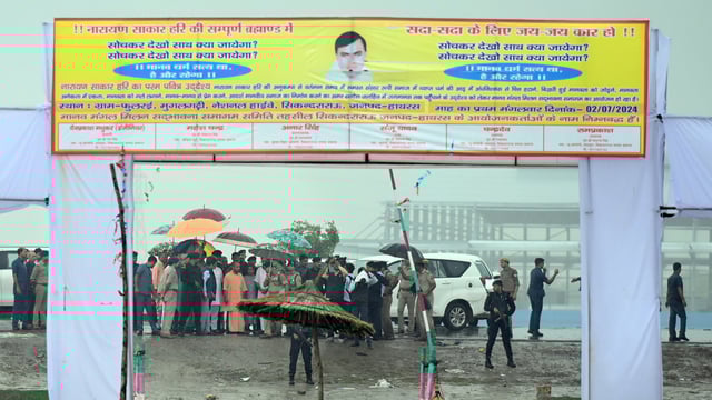 Uttar Pradesh Chief Minister Yogi Adityanath inspects the site of a stampede in which over 120 people were killed during a religious event, in Hathras. (HT PHOTO)