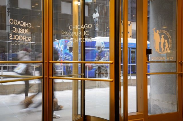 People walk past the Chicago Public Schools headquarters entrance on Jan. 30, 2025. (Audrey Richardson/Chicago Tribune)