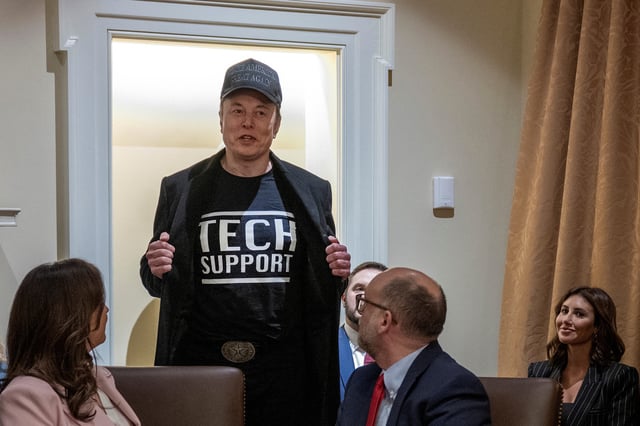 Elon Musk is pictured wearing a &#34;Tech Support&#34; shirt during a meeting of President Donald Trump&#39;s Cabinet in Washington, D.C. on February 26, 2025.