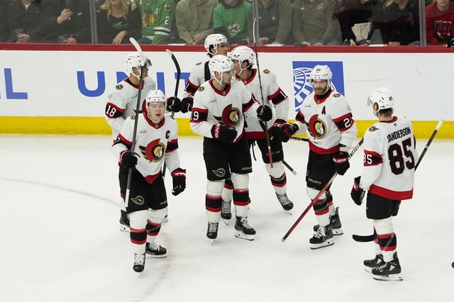 Mar 5, 2025; Chicago, Illinois, USA; Ottawa Senators center Tim Stützle (18) celebrates his game winning goal against the Chicago Blackhawks during overtime period at United Center. Mandatory Credit: David Banks-Imagn Images