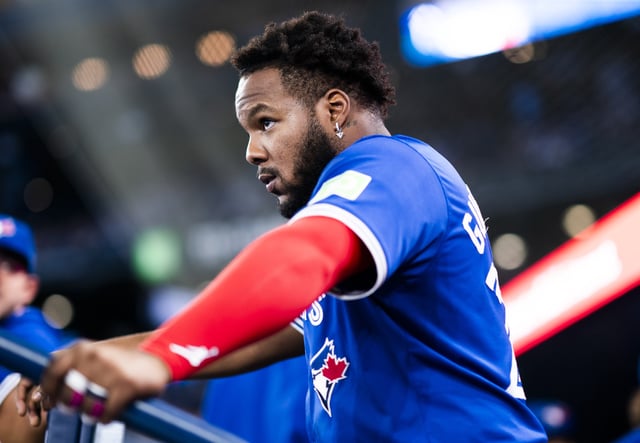 TORONTO, ON - SEPTEMBER 28: Vladimir Guerrero Jr. #27 of Toronto Blue Jays looks on from the dugout before playing against the Miami Marlins in their MLB game at the Rogers Centre on September 28, 2024 in Toronto, Ontario, Canada.
