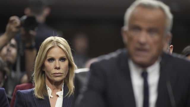 Cheryl Hines, wife of Robert F. Kennedy Jr., President Donald Trump's choice to be Secretary of Health and Human Services, watches as he appears before the Senate Finance Committee for his confirmation hearing, at the Capitol in Washington, Wednesday, Jan. 29, 2025. (AP Photo/Ben Curtis)