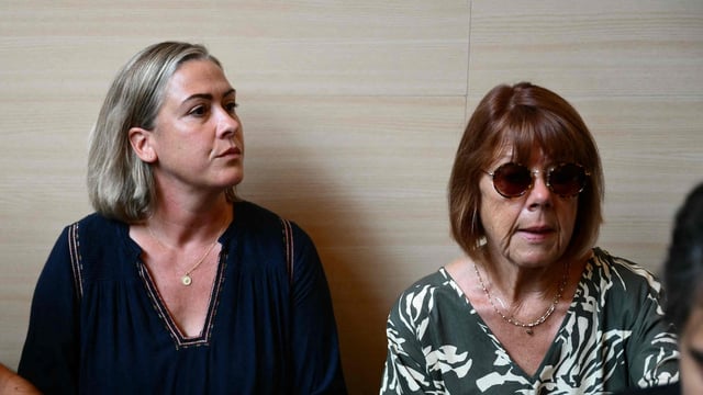 Gisele Pelicot (R) sits beside her daughter Caroline Darian at the courthouse during the trial of her husband in Avignon.