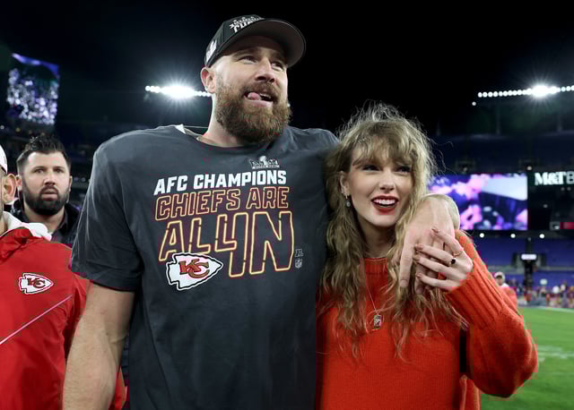 Travis Kelce #87 of the Kansas City Chiefs celebrates with Taylor Swift after a 17-10 victory against the Baltimore Ravens in the AFC Championship Game at M&amp;T Bank Stadium on January 28, 2024 in Baltimore, Maryland.
