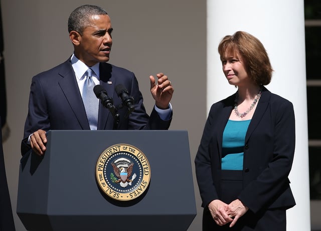 U.S. President Barack Obama gestures while nominating Patricia Ann Millett (R), an appellate lawyer, to become a federal judge, during an event in the Rose Garden at the White House June 4, 2013 in Washington, DC.