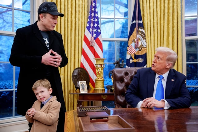 President Donald Trump is joined by billionaire Elon Musk, and his son, X Musk, during an executive order signing in the Oval Office at the White House on February 11 in Washington, D.C.