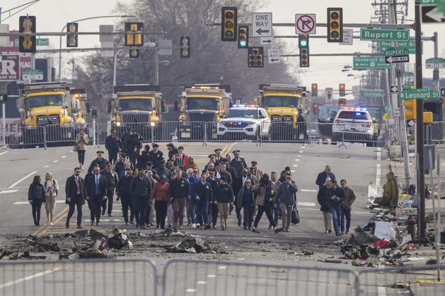 FILE - Pennsylvania Gov. Josh Shapiro, Philadelphia Mayor Cherelle Parker and other officials view the aftermath of a fatal small plane crashed in Philadelphia, Monday, Feb. 3, 2025. (AP Photo/Matt Rourke, File)
