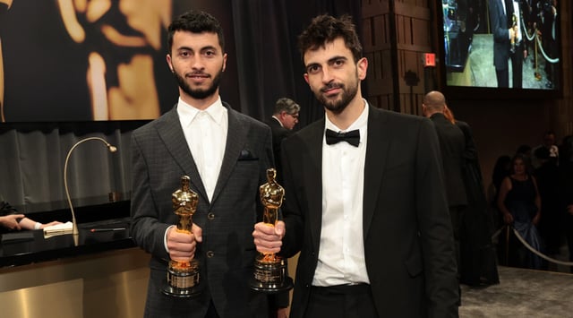 Basel Adra, left, and Yuval Abraham, winners of the best documentary feature award for "No Other Land," attend the 97th Annual Oscars Governors Ball on March 2, 2025, in Hollywood. (Photo by Monica Schipper/Getty Images)