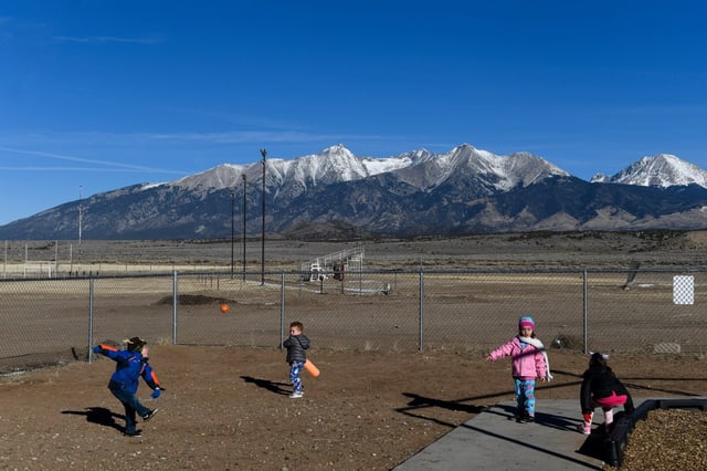 Students play on the playground at Sierra Grande K-12 in Blanca, Colorado, on Tuesday, Dec. 18, 2018. The school is located in rural Costilla County in southern Colorado.