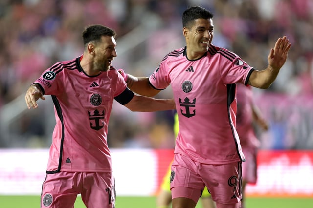 Lionel Messi #10 of Inter Miami CF celebrates with Luis Suarez #9 after scoring a goal in the 23rd minute against the Nashville SC during the first half in the Concacaf Champions Cup Round of 16 match at Chase Stadium on March 13, 2024 in Fort Lauderdale, Florida.
