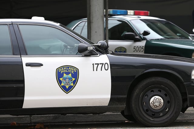 File: Patrol cars at the Oakland Police headquarters on Dec. 6, 2012, in Oakland, Calif.