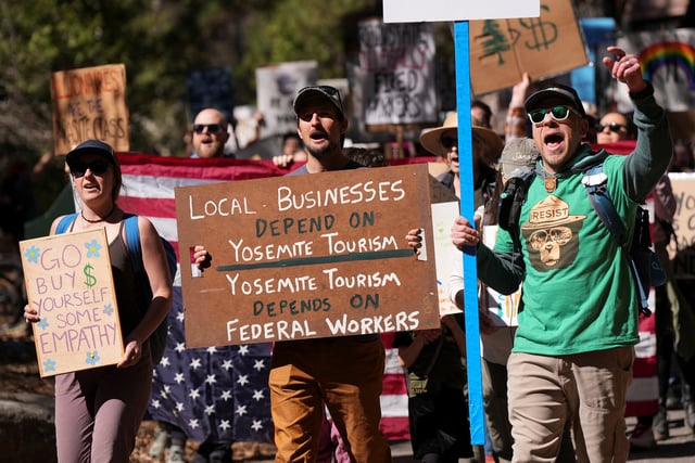 Protesters march in Yosemite National Park during a demonstration against mass firings of National Park Service employees by the Trump administration in Yosemite Valley, California, U.S. March 1, 2025. REUTERS/Nathan Frandino/File Photo