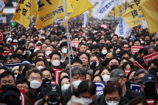 Doctors take part in a rally to protest against government plans to increase medical school admissions in Seoul, South Korea, March 3, 2024.