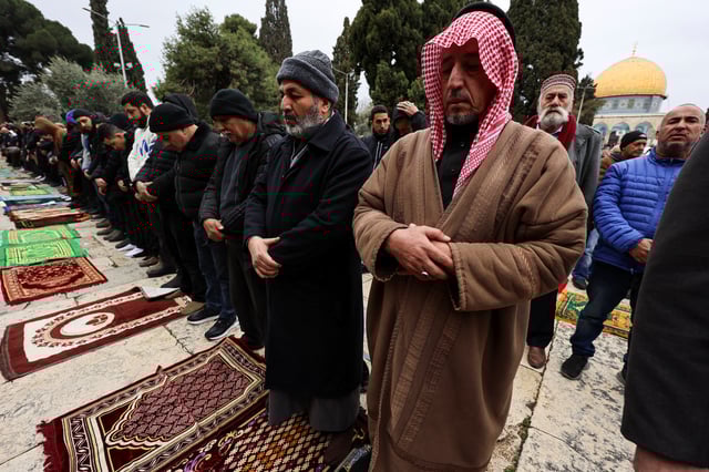 Muslim worshippers attend the first Friday prayers of Ramadan, in Al-Aqsa compound, also known to Jews as Temple Mount, in Jerusalem's Old City, March 7, 2025. REUTERS/Ammar Awad