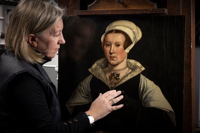 EMBARGOED 00.01 FRIDAY 7 MARCH: Is this the face of Lady Jane Grey? English Heritage Conservator Rachel Turnbull gives this mysterious portrait a final examination before it goes on display from today (7 March) at Wrest Park in Bedfordshire. New research by English Heritage, including dendrochronology (tree ring dating), XRF and infra-red reflectography, has provided compelling evidence in favour of confirming the mysterious portrait as depicting the infamous ‘Nine Days Queen’ - it would be the only known depiction painted during her lifetime. From the newly discovered evidence of a once more elaborate costume and the dating of the wooden panel from within her lifetime, to the deliberate scratching of her eyes, ears and mouth, it is possible that we are looking at the shadows of a once more royal portrait of Lady Jane Grey, toned down into subdued, Protestant martyrdom after her death. The portrait, on loan from a private collection, is on display from today at Wrest Park in Bedfordshire, alongside six other paintings including one of Wrest’s most prominent owners, Jemima Marchioness Grey.