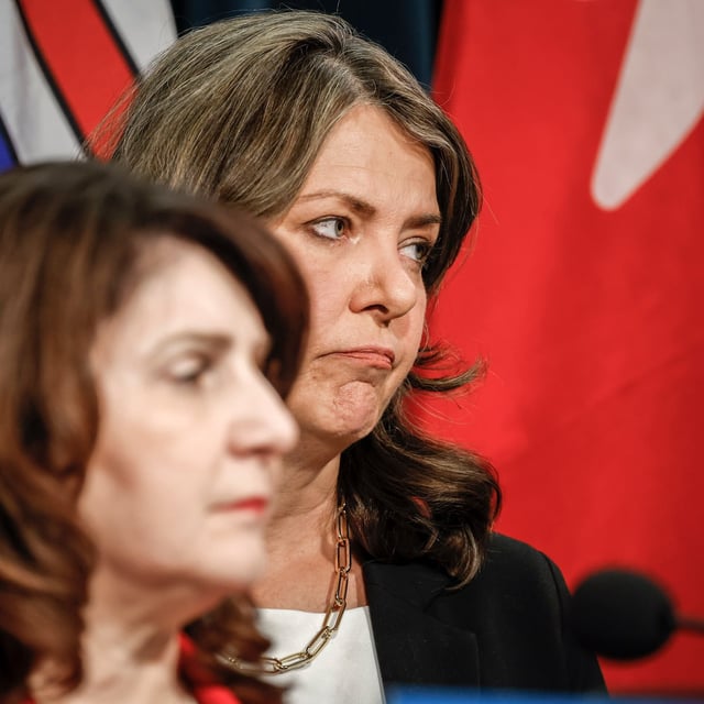 Alberta Premier Danielle Smith, right, and Minister of Health Adriana LaGrange provide an update on what steps the government is taking related to allegations by former Alberta Health Services CEO Athana Mentzelopoulos, in Calgary, Alta., Wednesday, Feb. 19, 2025.THE CANADIAN PRESS/Jeff McIntosh