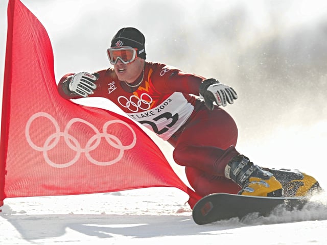 14 Feb 2002: Ryan Wedding of Canada competes in the qualifying round of the men's parallel giant slalom snowboarding event during the Salt Lake City Winter Olympic Games at the Park City Mountain Resort in Park City, Utah. DIGITAL IMAGE. Mandatory Credit: Adam Pretty/Getty Images