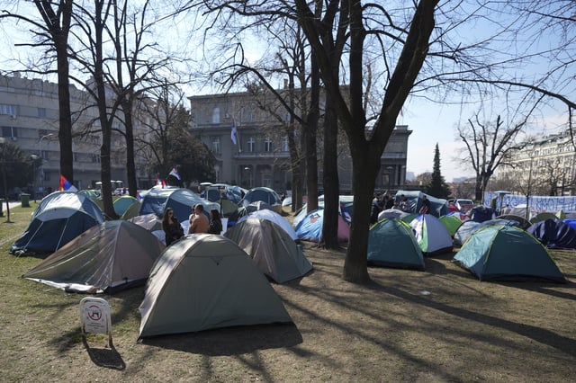 A group of students (The Students 2.0 group) set up a camp in front of the Serbian Presidency building and demanding a return to classes, in Belgrade, Serbia, Friday, March 7, 2025. (AP Photo/Darko Vojinovic)