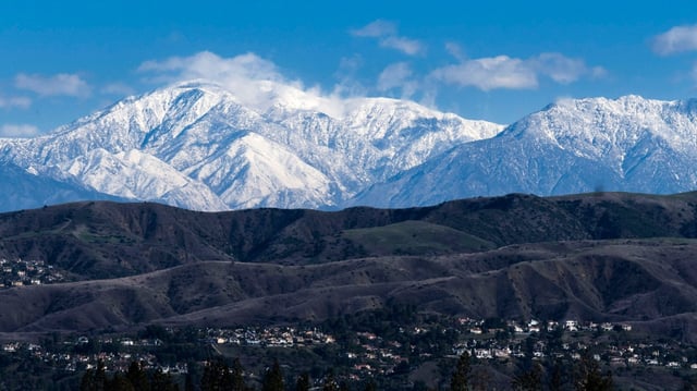 The snow-capped San Gabriel Mountains are seen from Anaheim on Friday, March 7, 2025. (Photo by Paul Bersebach, Orange County Register/SCNG)