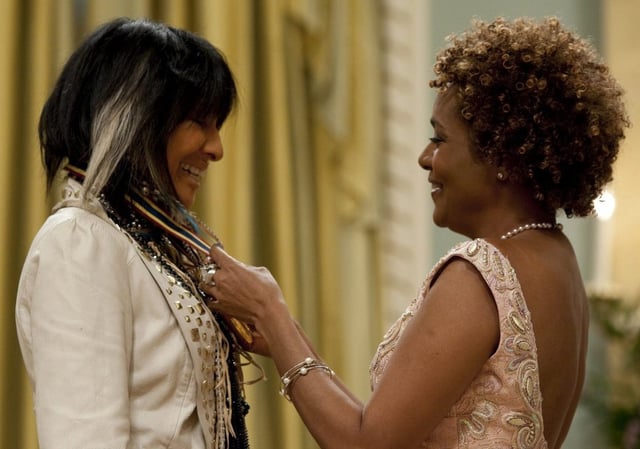 FILE - Governor General Michaelle Jean presents the Performing Arts Award to Buffy Sainte-Marie at Rideau Hall in Ottawa on Friday April 30, 2010.