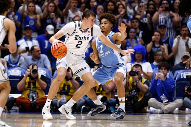 Presumed top 2025 NBA Draft pick Cooper Flagg and the Blue Devils are heavy road favorites vs. UNC on Saturday night.