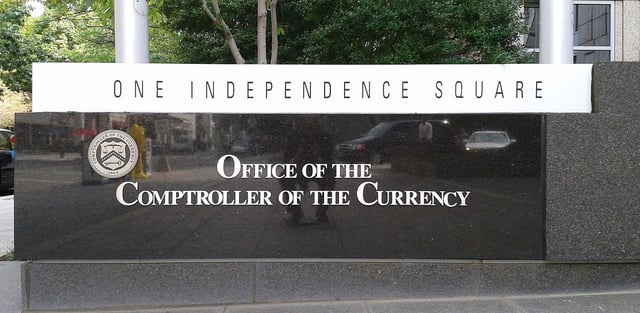 A sign outside the OCC office (CoinDesk)