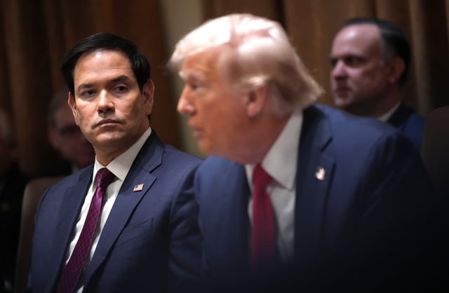 Secretary of State Marco Rubio listens as President Donald Trump delivers remarks during a Cabinet Meeting at the White House on February 26, 2025 in Washington, DC. Trump is holding the first Cabinet meeting of his second term, joined by Tesla and SpaceX CEO Elon Musk, head of the Department of Government Efficiency (DOGE). (Photo by Andrew Harnik/Getty Images)