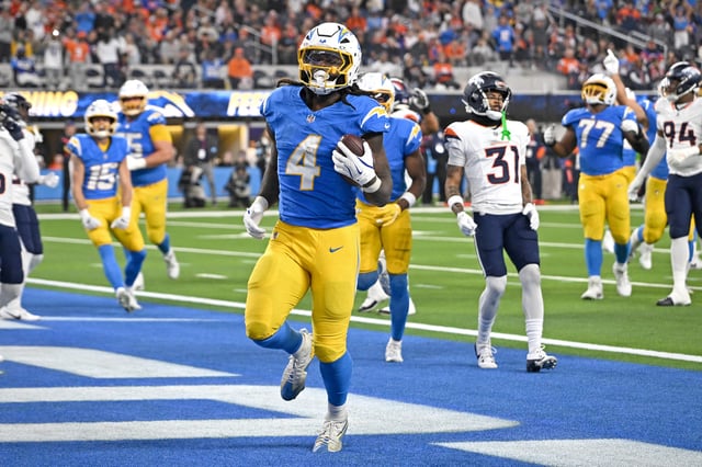 Dec 19, 2024; Inglewood, California, USA;  Los Angeles Chargers running back Gus Edwards (4) runs into the end zone for a touchdown in the second half at SoFi Stadium. Mandatory Credit: Jayne Kamin-Oncea-Imagn Images/File Photo