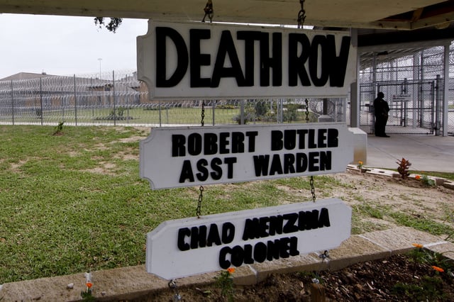 FILE - Death Row building at the Louisiana State Penitentiary Friday, Sept. 18, 2009, in Angola, La. (AP Photo/Judi Bottoni, File)
