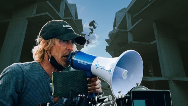 Michael Bay talking into a megaphone