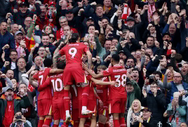 Soccer Football - Premier League - Liverpool v Southampton - Anfield, Liverpool, Britain - March 8, 2025 Liverpool's Mohamed Salah celebrates scoring their second goal with teammates REUTERS/Phil Noble