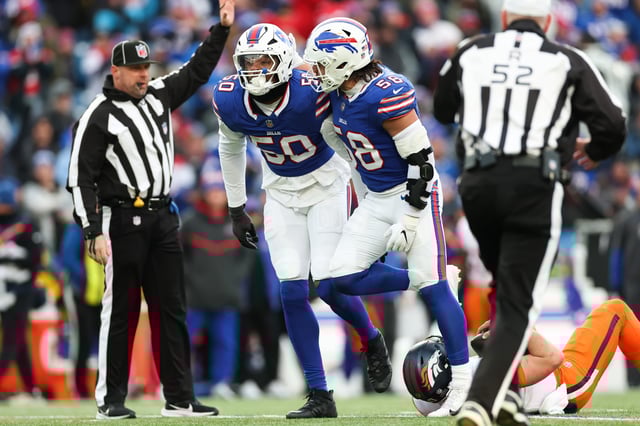 ORCHARD PARK, NEW YORK - JANUARY 12: Greg Rousseau #50 of the Buffalo Bills celebrates a sack against the Denver Broncos in the fourth quarter during the AFC Wild Card Playoffs at Highmark Stadium on January 12, 2025 in Orchard Park, New York.