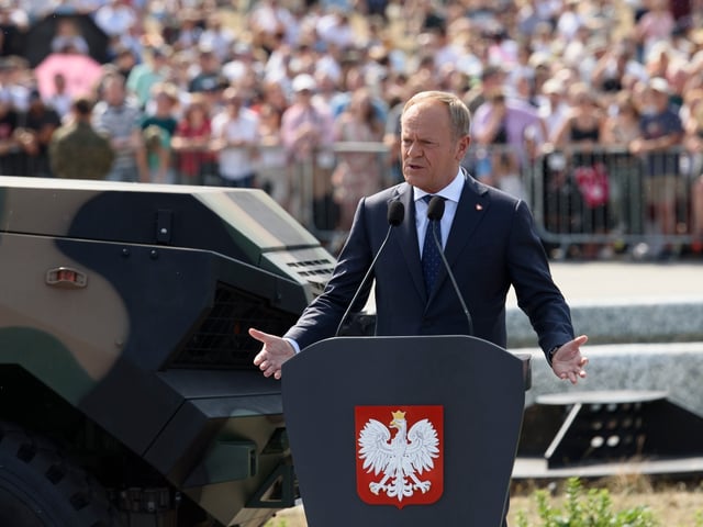 Poland's Prime Minister Donald Tusk is gesturing during his speech as he is taking part in the National Army Day in Warsaw, Poland, on August 11, 2024. Thousands of members of the Polish armed forces are taking part in the Armed Forces Day military parade that takes place annually on August 15 to commemorate Poland's victory over the Soviet Union's army in 1920. (Photo by Aleksander Kalka/NurPhoto via Getty Images)
