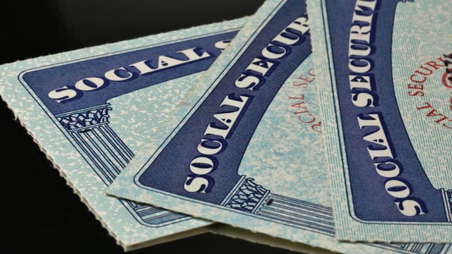 An image shows 3 cards that say SOCIAL SECURITY.