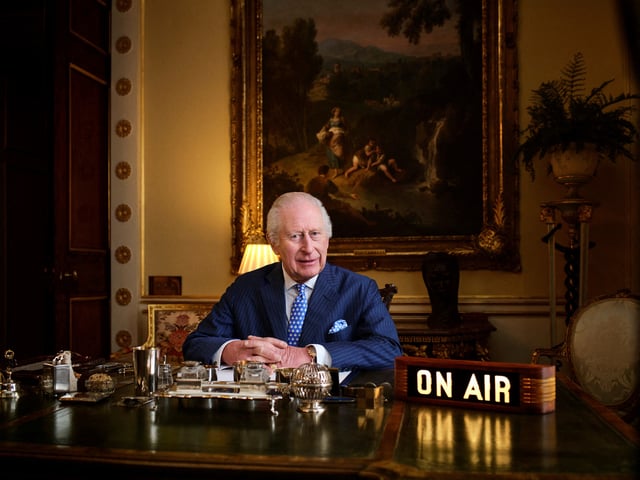Britain's King Charles poses in his office where "The King's Music Room" recording takes place in Buckingham Palace, London, Britain, in this undated handout photo. The King’s Music Room - Courtesy of Apple Music/Handout via REUTERS/File Photo