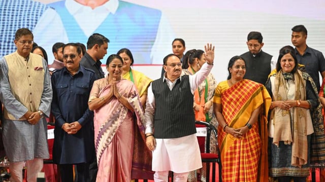 BJP president JP Nadda and CM Rekha Gupta with senior party leaders at JLN Stadium on Saturday. (Sanchit Khanna/HT Photo)