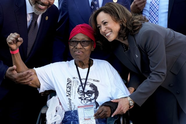 FILE - Annie Pearl Avery, left, poses for a photo with Vice President Kamala Harris before walking across the Edmund Pettus Bridge commemorating the 59th anniversary of the Bloody Sunday voting rights march in 1965, Sunday, March 3, 2024, in Selma, Ala. (AP Photo/Mike Stewart, File)