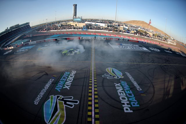 Aric Almirola, driver of the #19 Younglife Toyota, celebrates with a burnout after winning the NASCAR Xfinity Series GOVX 200 at Phoenix Raceway on March 08, 2025 in Avondale, Arizona.