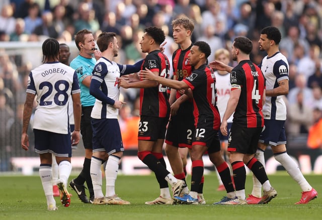 Soccer Football - Premier League - Tottenham Hotspur v AFC Bournemouth - Tottenham Hotspur Stadium, London, Britain - March 9, 2025 Tottenham Hotspur's James Maddison clashes with AFC Bournemouth's James Hill and Dean Huijsen REUTERS/David Klein
