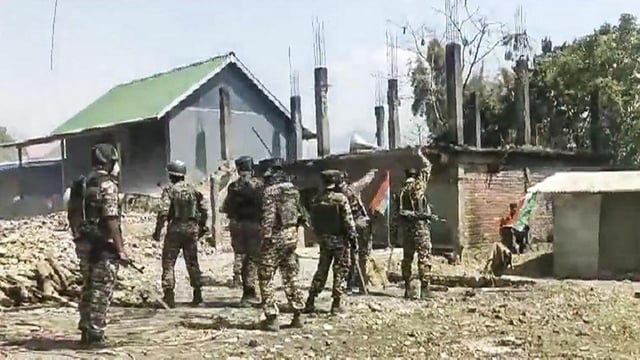 Security personnel stand guard during an indefinite shutdown by the Kuki Zo Council in Manipur. (PTI)