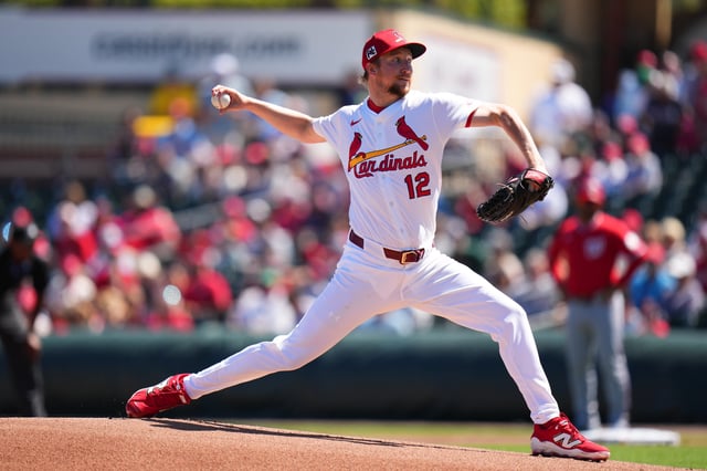 JUPITER, FLORIDA - MARCH 06: Erick Fedde #12 of the St. Louis Cardinals throws a pitch against the Washington Nationals during the first inning of a spring training game at Roger Dean Stadium on March 06, 2025 in Jupiter, Florida.