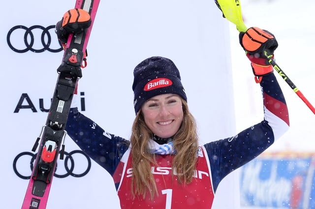 Mikaela Shiffrin celebrates her third place finish.