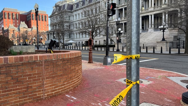 Police tape remains at the scene of an overnight shooting on a street bordering the White House complex, after Secret Service say they shot a man brandishing a firearm in Washington, D.C., U.S. March 9, 2025. REUTERS/Kia Johnson