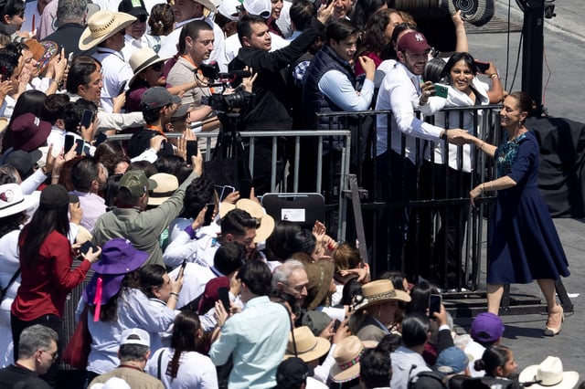 Mexico's President Claudia Sheinbaum greets supporters during an event to give details on the country's response to U.S. President Donald Trump's 25% tariffs on imports from Mexico, including retaliatory tariffs to U.S., at Zocalo Square in downtown Mexico City, Mexico March 9, 2025. REUTERS/Quetzalli Nicte-Ha