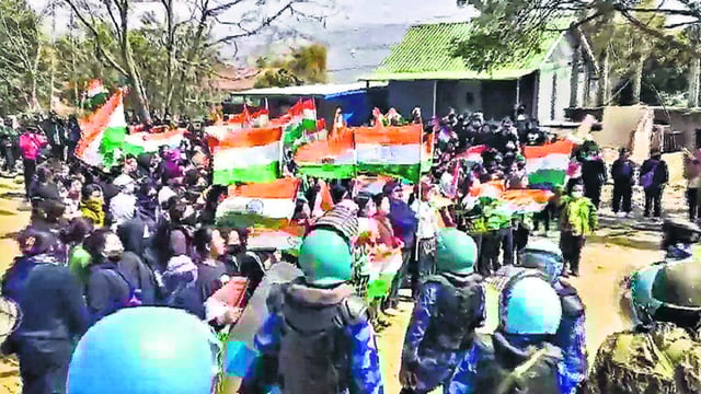 Security personnel stand guard during an indefinite shutdown by the Kuki-Zo Council in Manipur. (PTI)