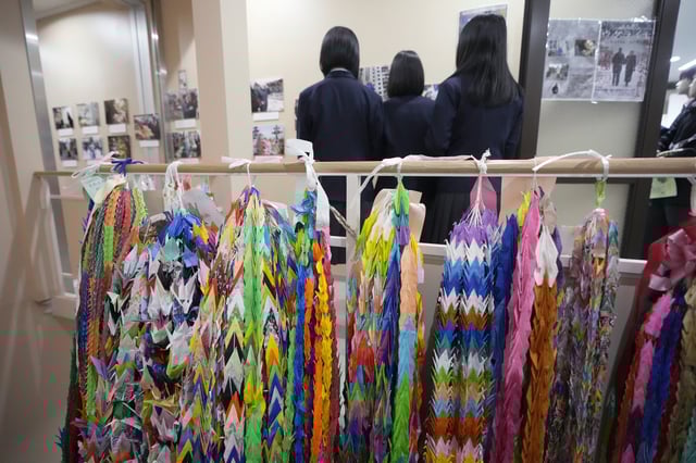 Donated colorful origami cranes are displayed at the Center of the Tokyo Raids and War Damage, on Feb. 24, 2025, in Tokyo. (AP Photo/Eugene Hoshiko)
